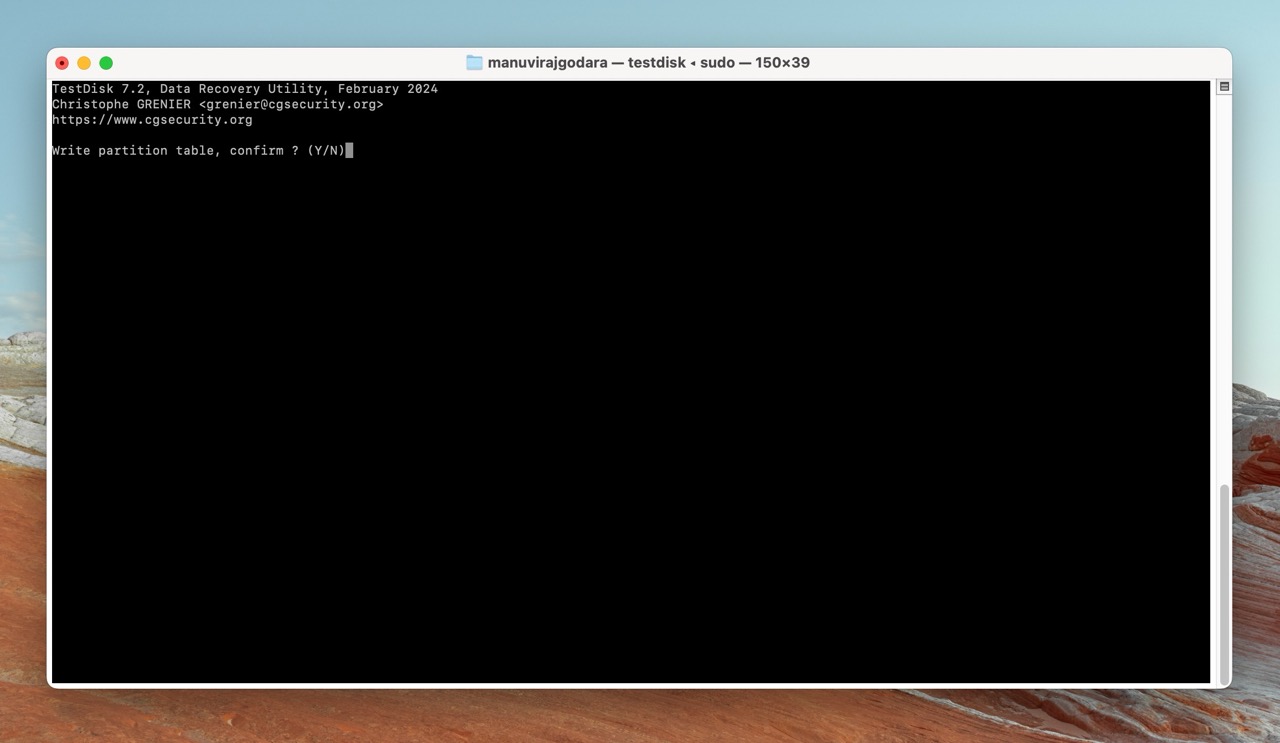 TestDisk on Mac prompting the user to confirm writing the partition table.